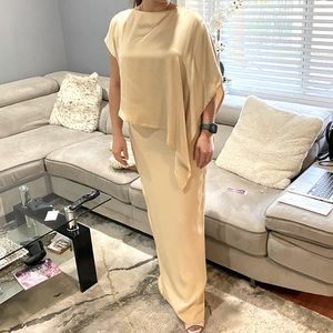 A very unique and classic, elegant dress styled by Tom & Linda Platt!